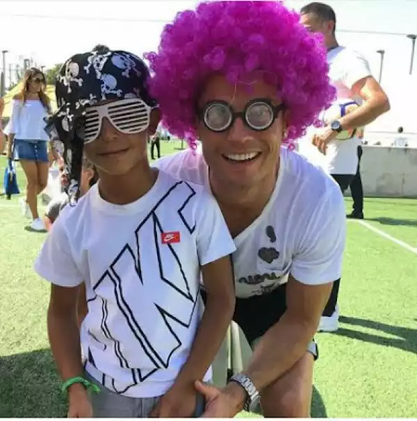 C. Ronaldo Rocks Pink Wig For Playful Snap With Son